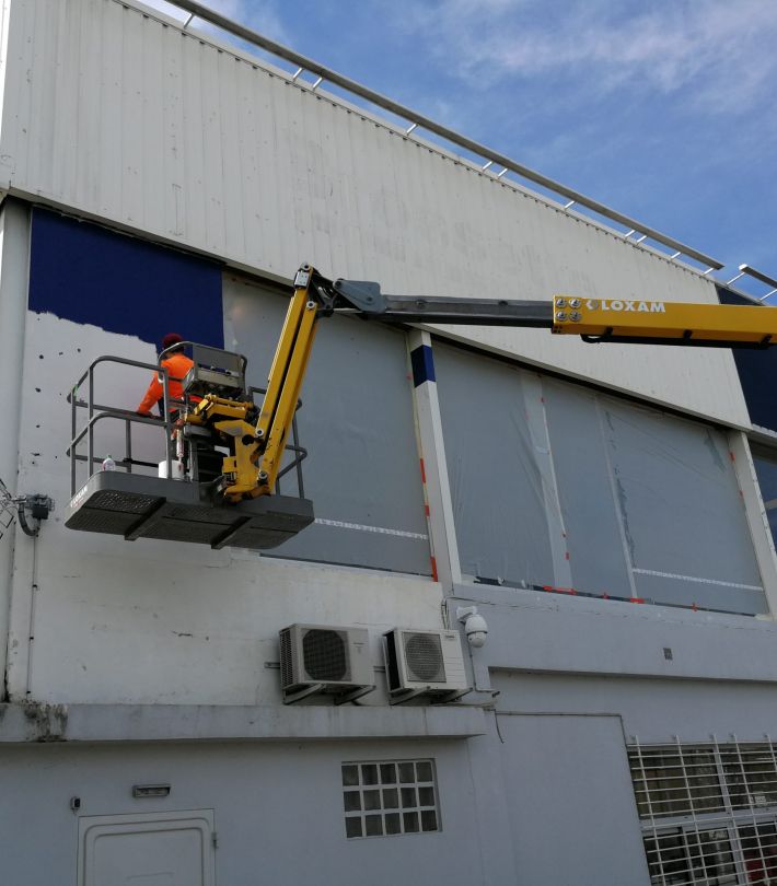 Application de peinture extérieure sur mur en pierre à Blagnac